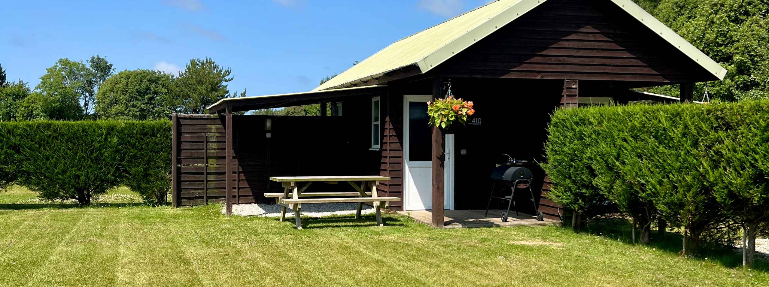 an ultra deluxe pitch with private facilities at the monkey tree holiday park in cornwall