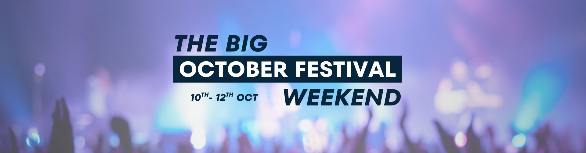Blurred image of a crowd at a concert with blue and purple lighting. Bold text in the centre reads: THE BIG OCTOBER FESTIVAL WEEKEND 10th - 12th OCT, celebrating the excitement of the October festival weekend.